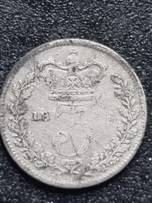 coin showing the date 1832